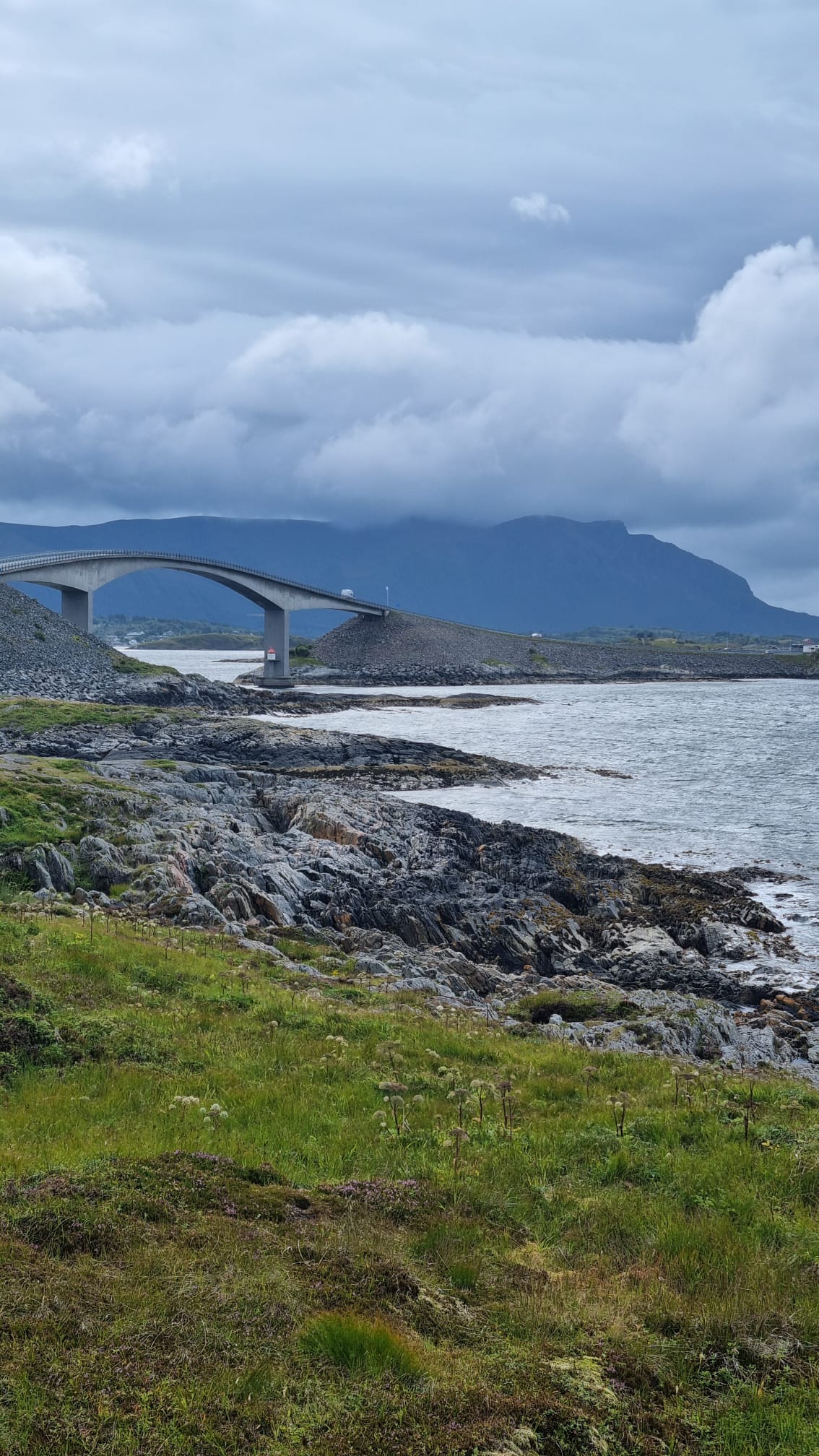 The Atlantic Road bridge seen across the coastal rocks and sea