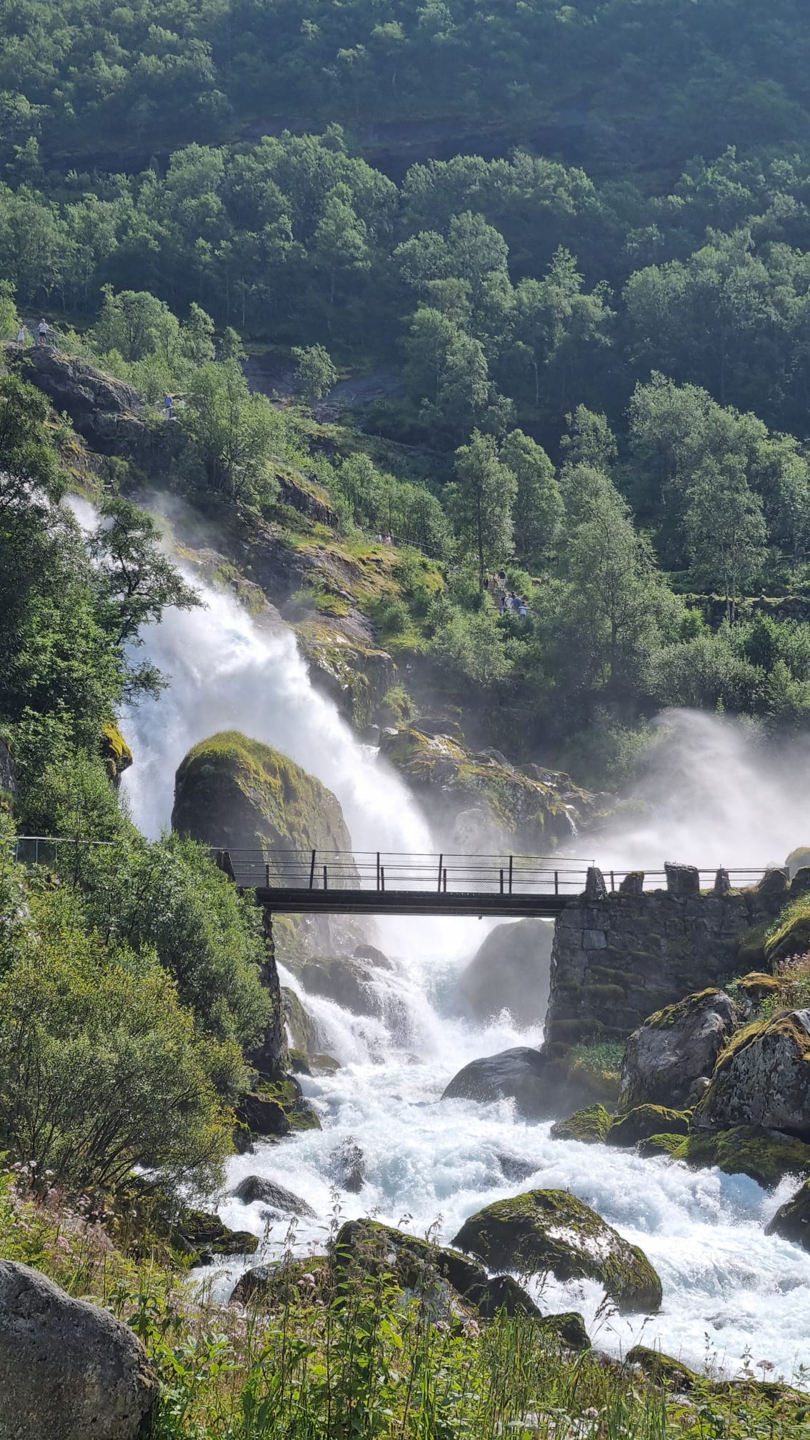 The waterfall Kleivafossen and its bridge on the walk up towards Briksdalsbreen
